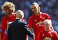 Football Soccer Britain - Leicester City v Manchester United - FA Community Shield - Wembley Stadium - 7/8/16 Manchester United's Zlatan Ibrahimovic and Marouane Fellaini shake hands with Sir Bobby Charlton before the game Reuters / Eddie Keogh Livepic EDITORIAL USE ONLY. No use with unauthorized audio, video, data, fixture lists, club/league logos or "live" services. Online in-match use limited to 45 images, no video emulation. No use in betting, games or single club/league/player publications. Please contact your account representative for further details.