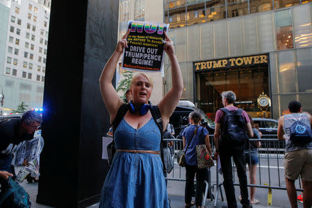 A small group of people protest against the Trump administration and demand immediate diplomatic talks with North Korea to prevent nuclear war, in New York, U.S., August 9, 2017. REUTERS/Eduardo Munoz