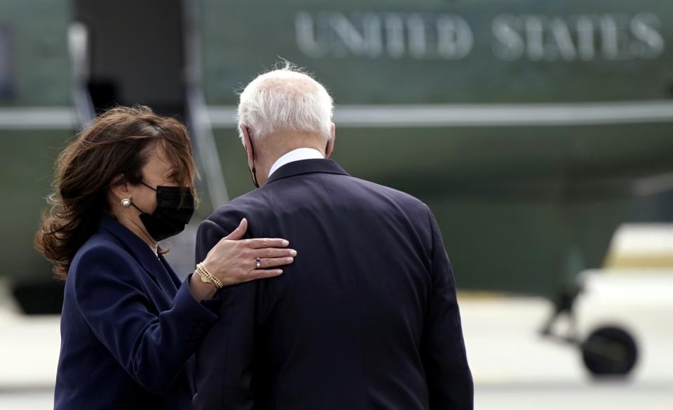 President Biden and Vice President Kamala Harris with Marine One in background