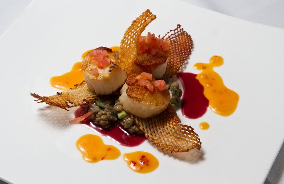 Seared scallops with herbed lentils, cabernet reduction and citrus ginger glaze at Scarborough Fair in Sea Girt.