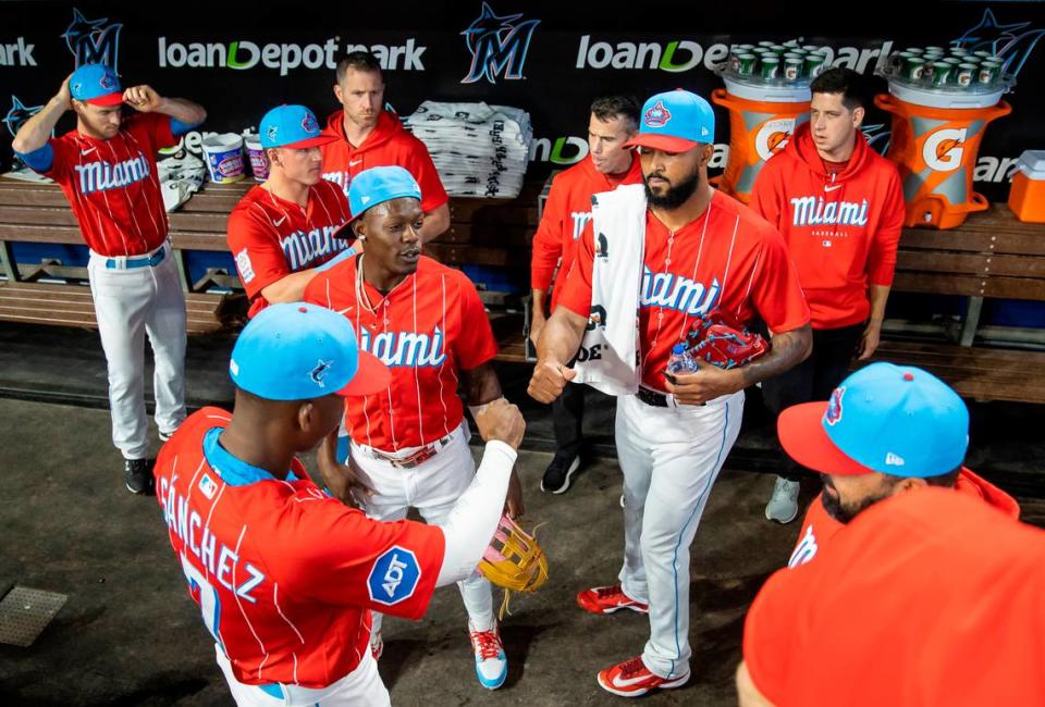 Miami Marlins starting pitcher Sandy Alcantara (22) greets right fielder Jesus Sanchez (7) before the start of their MLB game against the Cincinnati Reds at loanDepot park on Saturday, May 13, 2023, in Miami, Fla.