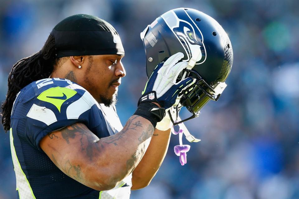 Marshawn Lynch back? The Raiders are reportedly considering trading for the retired runner. (Getty Images)