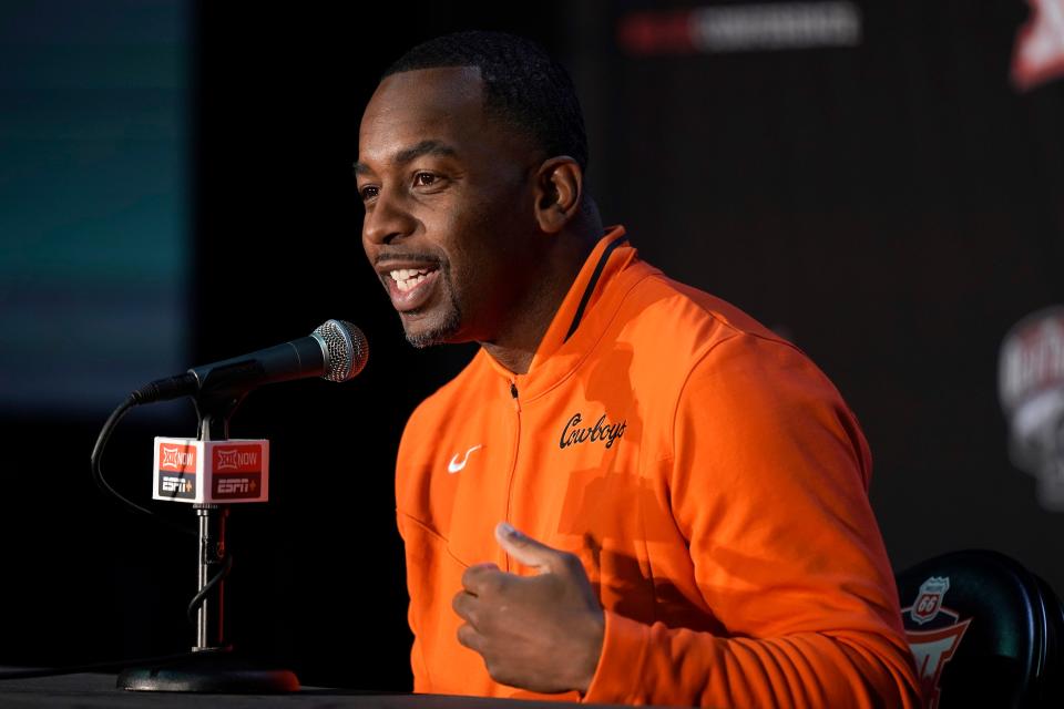 Oklahoma State head coach Mike Boynton speaks to the media during Big 12 NCAA college basketball media day Wednesday, Oct. 19, 2022, in Kansas City, Mo. (AP Photo/Charlie Riedel)