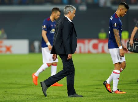 Football Soccer - Feyenoord v Manchester United - UEFA Europa League Group Stage - Group A - De Kuip Stadium, Rotterdam, Netherlands - 15/9/16 Manchester United manager Jose Mourinho looks dejected at the end of the match Reuters / Michael Kooren