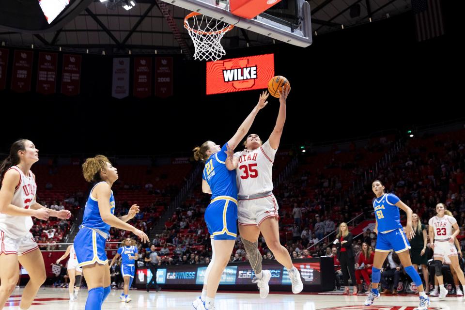 Utah Utes forward Alissa Pili (35) jumps for a basket while UCLA Bruins forward, Lina Sontag (21) blocks at the Huntsman Center in Salt Lake City on Jan. 22, 2024. | Marielle Scott, Deseret News