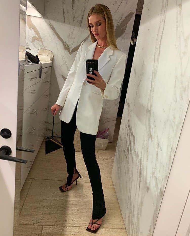 <p>Something about this cream blazer has us considering wearing a <a href="https://www.elle.com/uk/fashion/what-to-wear/g29534510/wedding-suits-women/" rel="nofollow noopener" target="_blank" data-ylk="slk:suit to our (dream) wedding;elm:context_link;itc:0;sec:content-canvas" class="link ">suit to our (dream) wedding</a>. </p><p>You can't really go wrong with black, strappy heels. But if the Bottega Veneta's are a touch expensive for you, try <a href="https://www.topshop.com/en/tsuk/product/shoes-430/sandals-5388227/wide-fit-ritz-black-strap-high-heels-9167239" rel="nofollow noopener" target="_blank" data-ylk="slk:Topshop;elm:context_link;itc:0;sec:content-canvas" class="link ">Topshop</a>'s take on the trend.</p>