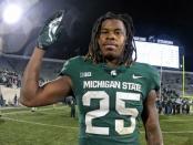 Nov 24, 2018; East Lansing, MI, USA; Michigan State Spartans wide receiver Darrell Stewart Jr. (25) celebrates after a game against the Rutgers Scarlet Knights at Spartan Stadium. Mandatory Credit: Mike Carter-USA TODAY Sports