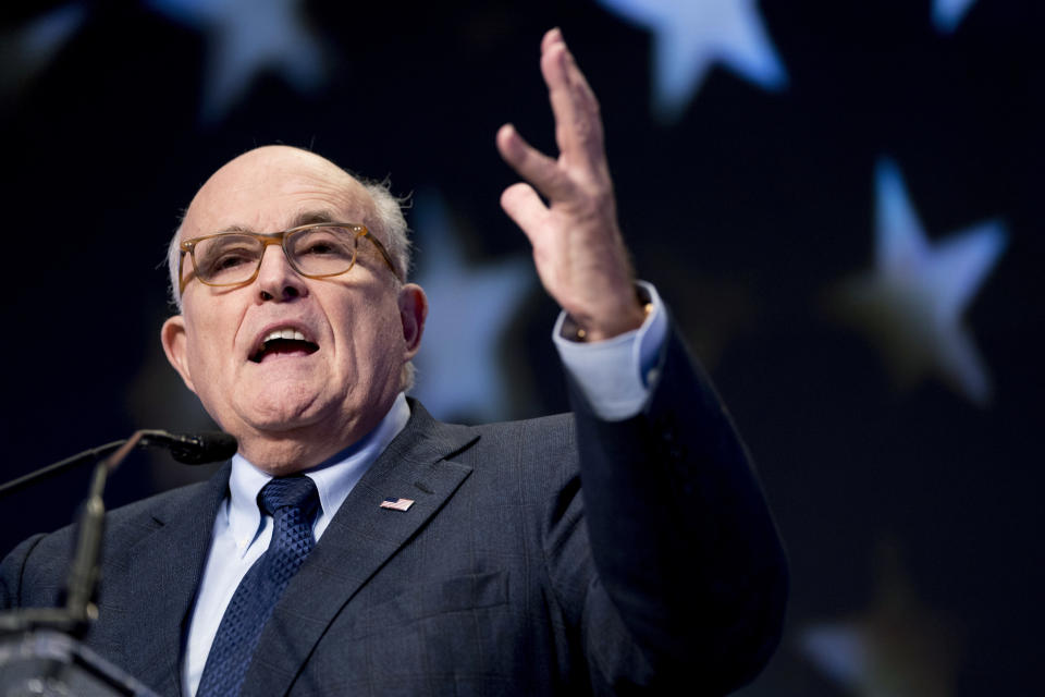 FILE - In this May 5, 2018, file photo, Rudy Giuliani, an attorney for President Donald Trump, speaks at the Iran Freedom Convention for Human Rights and democracy in Washington. Giuliani appears in a scene in the new “Borat” film. The scene, which was filmed in a New York hotel room in July, resulted in Giuliani calling police. (AP Photo/Andrew Harnik, File)