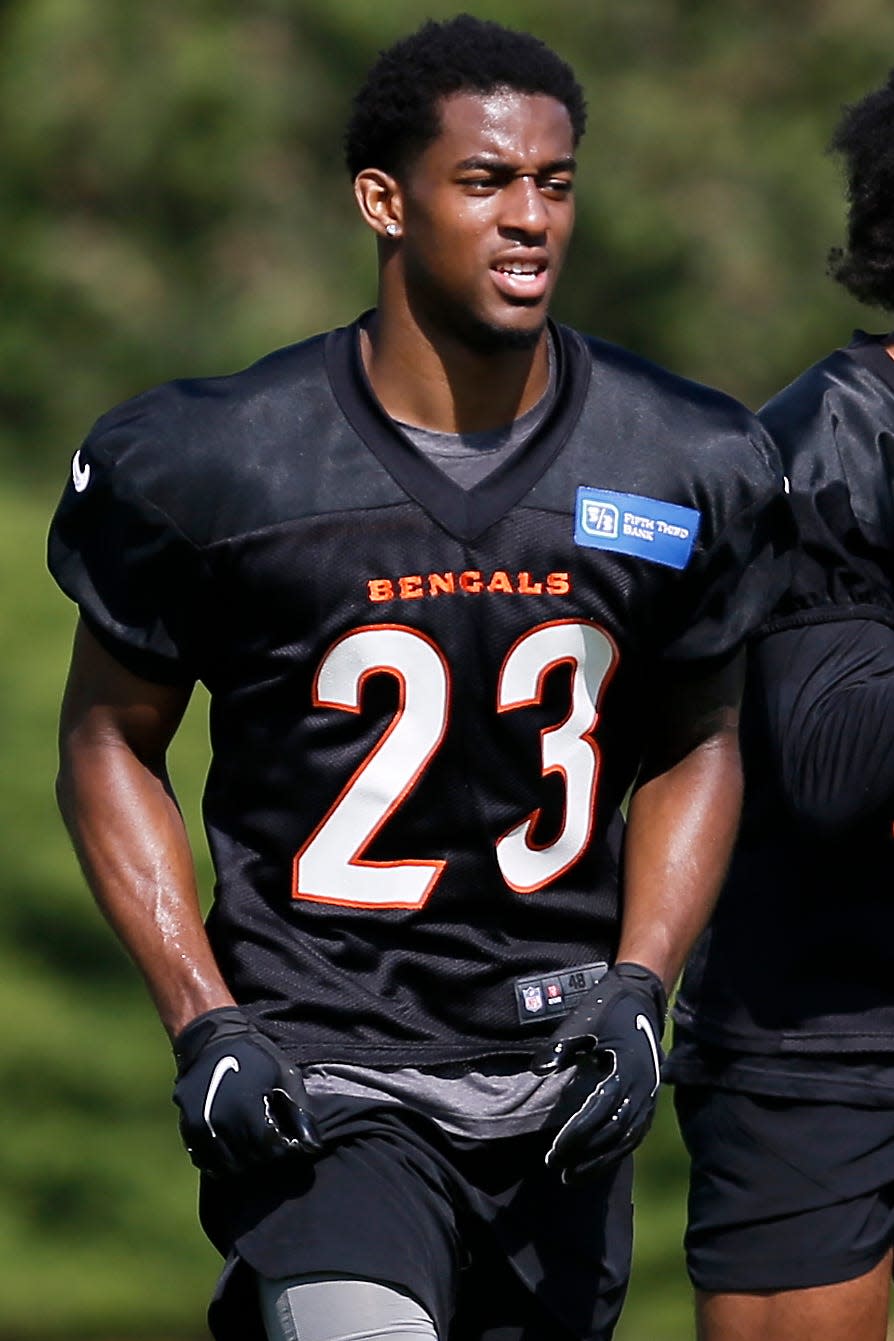 Defensive back Dax Hill (23) runs between stations during the first day of Cincinnati Bengals rookie camp at the Paul Brown Stadium practice field in downtown Cincinnati on Friday, May 13, 2022. 