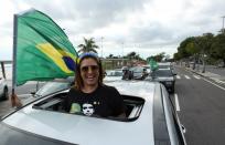 A supporter of far-right Brazilian President Jair Bolsonaro protests against the recommendations for social isolation of the state government of Amazonas due to the spread of coronavirus disease (COVID-19), in Manaus