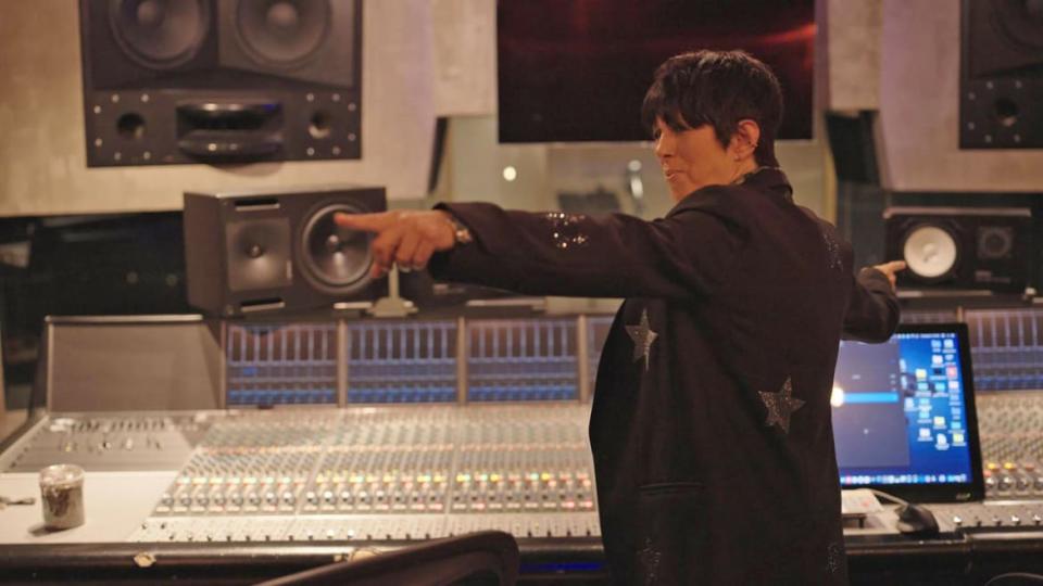 Diane Warren points in a studio in a still from “Diane Warren: Relentless.”