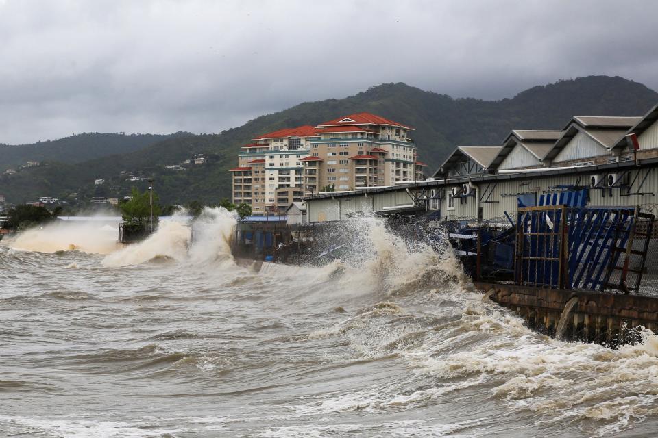 Waves crash into a sea wall after Hurricane Beryl made landfall, in Port of Spain, Trinidad and Tobago Monday.