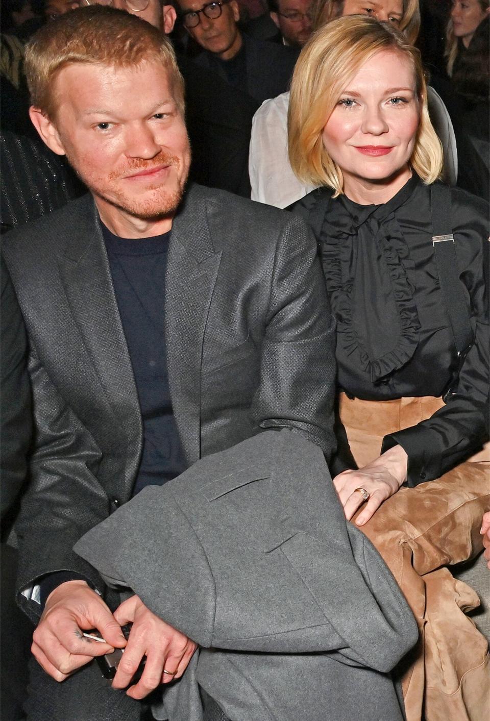 Jesse Plemons and Kirsten Dunst attend the Christian Dior front row during Paris Fashion Week Haute Couture Spring Summer 2023 on January 23, 2023 in Paris, France.