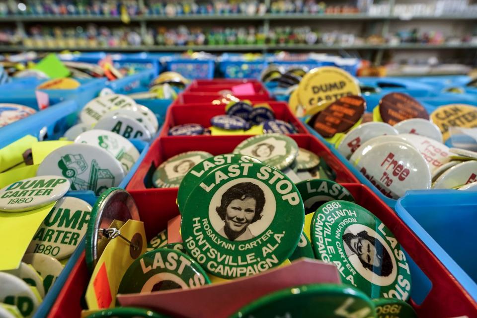 A campaign button is seen inside the Plains Trading Post, Monday, Nov. 20, 2023, in Plains, Ga. Rosalynn Carter, the closest adviser to Jimmy Carter during his one term as U.S. president and their four decades thereafter as global humanitarians, died Sunday, Nov. 19, 2023. She was 96. (AP Photo/Mike Stewart)