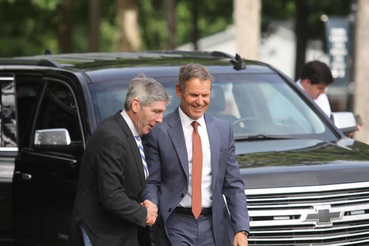 Gov. Bill Lee, right, with Bob Rolfe, who has headed the state's Department of Economic and Community Development since 2017. Rolfe is leaving the post to rejoin the private market.