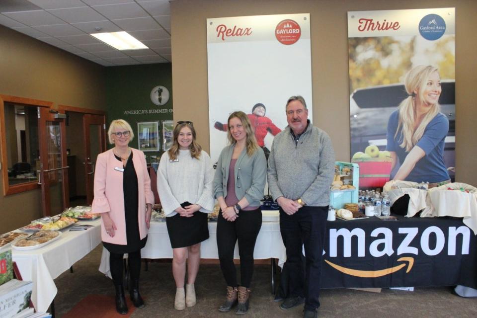 (From left) Julie and Mason Leach of Amazon, and Sarah Harding and Paul Gunderson of the Gaylord Area Chamber of Commerce welcome the addition of the Amazon Delivery Partner Program to the chamber on March 22.