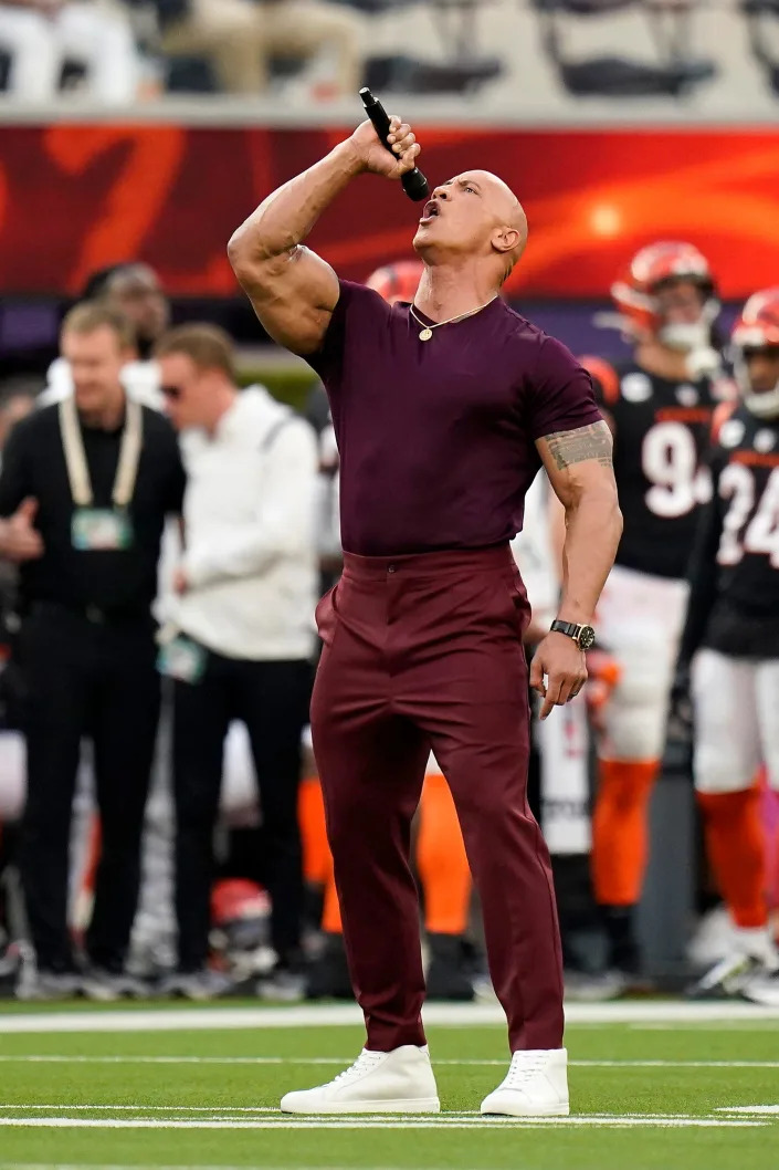 Dwayne &#x00201c;The Rock&#x00201d; Johnson introduces both teams before the first quarter of Super Bowl 56 between the Cincinnati Bengals and the Los Angeles Rams at SoFi Stadium in Inglewood, Calif., on Sunday, Feb. 13, 2022. The Rams came back in the final minutes of the game to win 23-20 on their home field. 