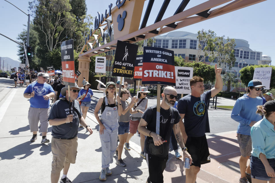 SAG-AFTRA and WGA picketers outside Disney offices in Burbank (Getty Images)