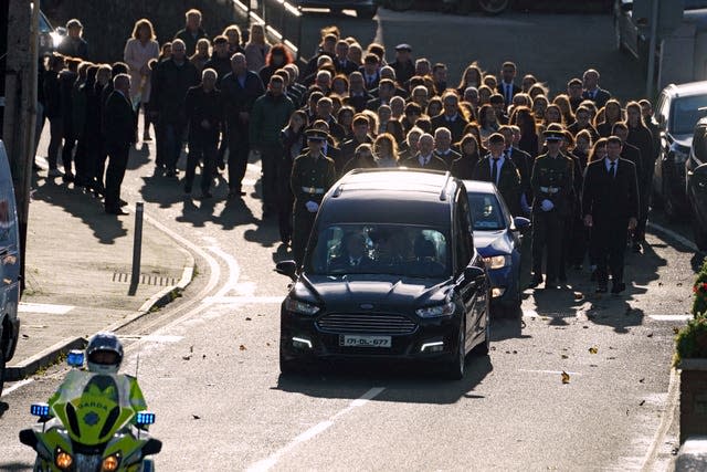 Family and mourners arrive at St Michael’s Church