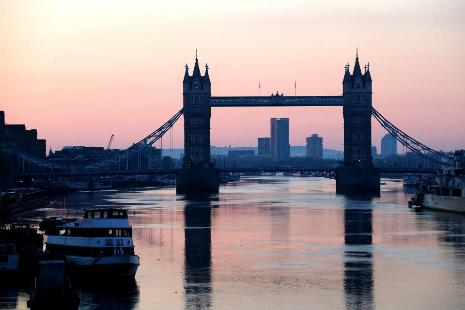 LONDON, ENGLAND - APRIL 26: A view of Tower Bridge as the sun rises on April 26, 2020 in London, England. The 40th London Marathon was due to take place today, with thousands of runners due to take part. It has postponed until October 04 due to the coronavirus (COVID-19) outbreak.  (Photo by Alex Pantling/Getty Images)