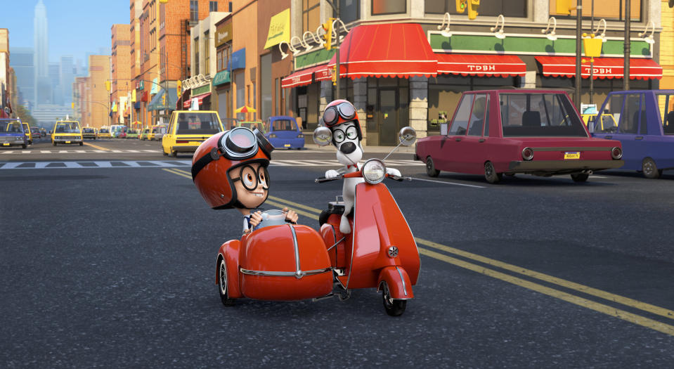 This image released by DreamWorks Animation shows Sherman, voiced by Max Charles, left, and Mr. Peabody, voiced by Ty Burell, in a scene from "Mr Peabody & Sherman." (AP Photo/ DreamWorks Animation)
