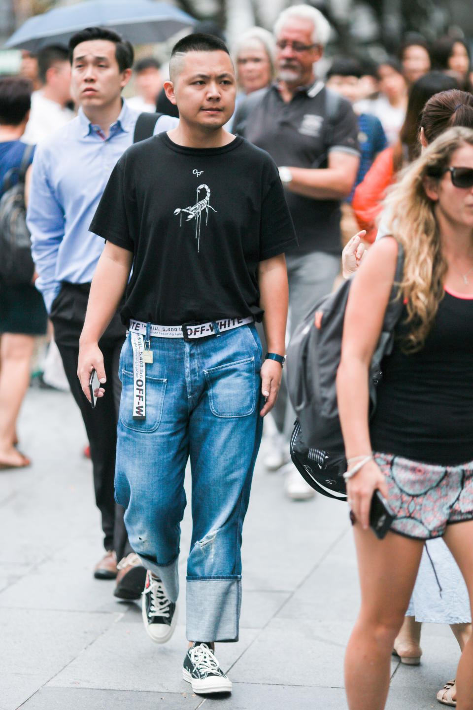 Off-White belt tied at the side and pants with folded ends. More people in Singapore have been spotting this look recently. (Photo: Don Wong)