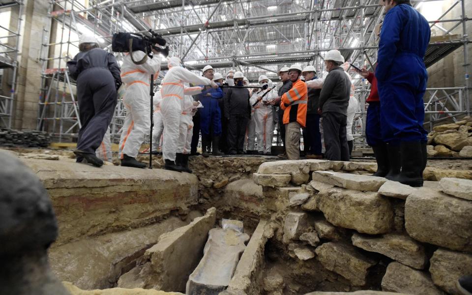 Burial sites have been found under the Notre-Dame Cathedral in Paris by workers restoring the church after a fire in 2019. Archaeologists showed Roselyne Bachelot, France’s culture minister, the discoveries - JULIEN DE ROSA/AFP