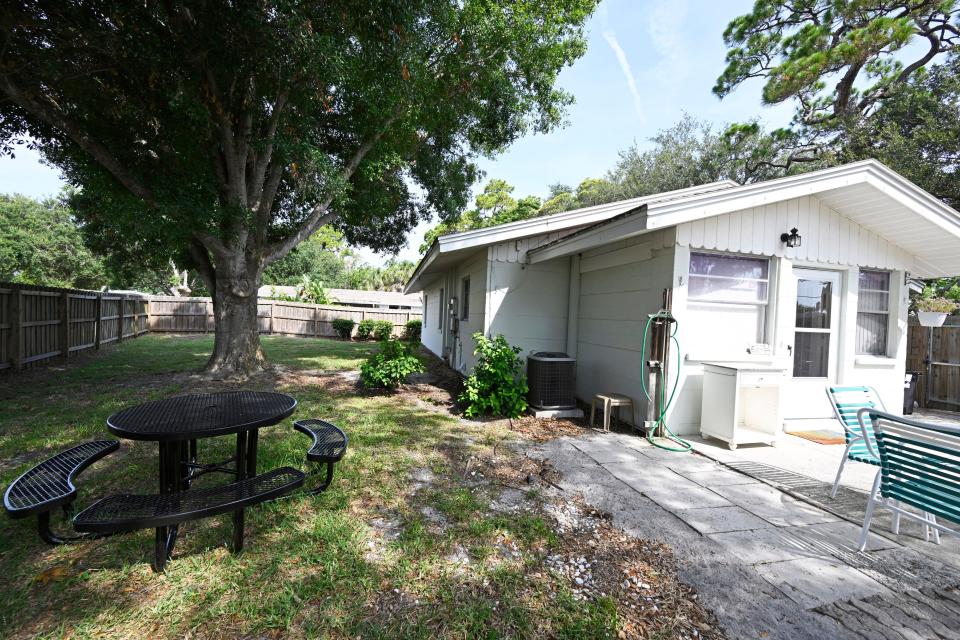 The fenced back yard at Francis House, which is on the grounds of Pine Shores Presbyterian Church in Sarasota, is a safe place for children to play, or for family gatherings. Children can also play at the church’s playground elsewhere on the church property.