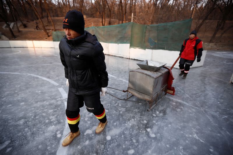 The Wider Image: On a frozen pond far from the Olympics, meet China's ice hockey veterans