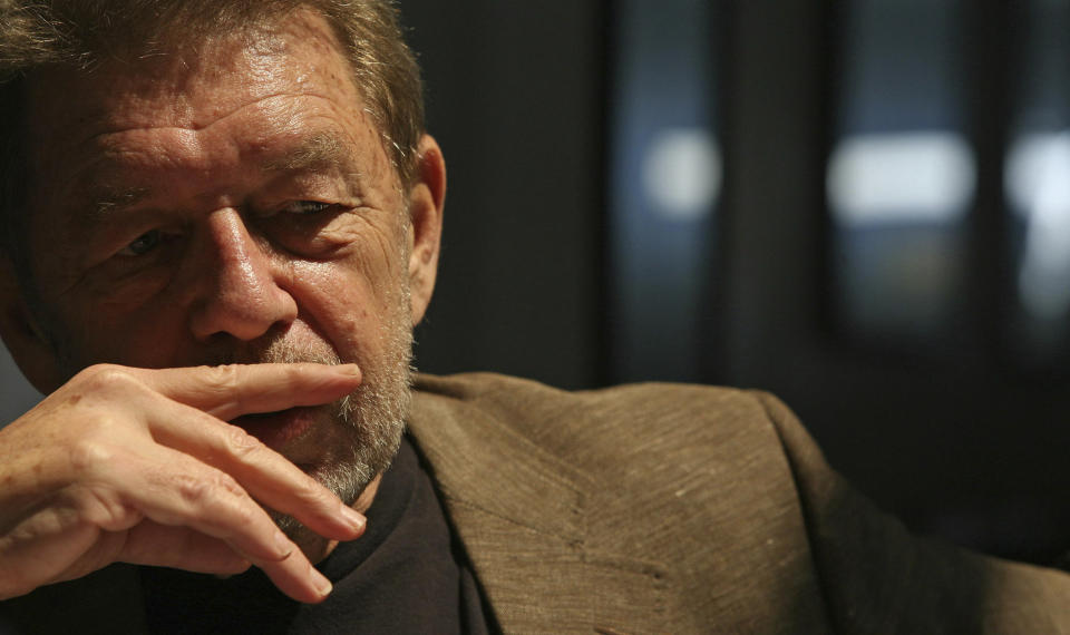 FILE - In this June 5, 2007 file photo, Pete Hamill responds during an interview at the Skylight Diner in New York. The longtime New York City newspaper columnist and author has died. His brother Denis Hamill said Pete died Wednesday, Aug. 5, 2020 in Brooklyn. (AP Photo/Bebeto Matthews, File)