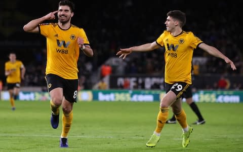 Wolverhampton Wanderers' Ruben Neves celebrates scoring his side's second goal of the game - Credit: PA