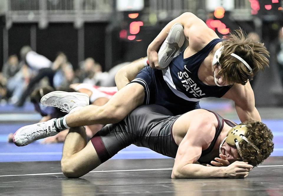 Penn State’s Tyler Kasak controls Minnesota’s Drew Roberts in their 149 pound first round consolation match of the NCAA Championships on Thursday, March 21, 2024 at TMobile Center in Kansas City, Mo. Kasak took care of Roberts, 14-5.