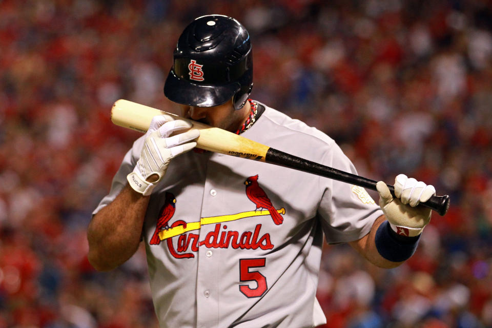 ARLINGTON, TX - OCTOBER 23: Albert Pujols #5 of the St. Louis Cardinals at bat during Game Four of the MLB World Series against the Texas Rangers at Rangers Ballpark in Arlington on October 23, 2011 in Arlington, Texas. (Photo by Ronald Martinez/Getty Images)