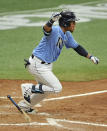 Tampa Bay Rays pinch hitter Michael Perez celebrates his winning RBI off New York Yankees closer Zack Britton during the ninth inning of a baseball game Sunday, Aug. 9, 2020, in St. Petersburg, Fla. (AP Photo/Steve Nesius)