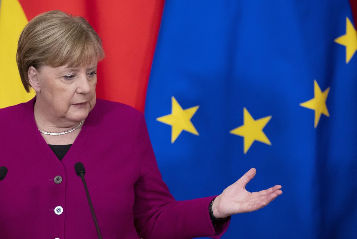 German Chancellor Angela Merkel gestures during her and Russian President Vladimir Putin joint news conference following their talks in the Kremlin in Moscow, Russia, Saturday, Jan. 11, 2020. Merkel visits Moscow to discuss current international issues such as the situation in Syria, Libya, Ukraine, US-Iran tensions, as well as bilateral relations. (AP Photo/Pavel Golovkin, Pool)