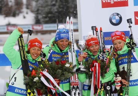 Biathlon - IBU World Championships - Women's 4 x 6km relay - Hochfilzen, Austria - 17/2/17 - Vanessa Hinz, Franziska Hildebrand, Maren Hammerschmidt and Laura Dahlmeier of Germany react. REUTERS/Leonhard Foeger