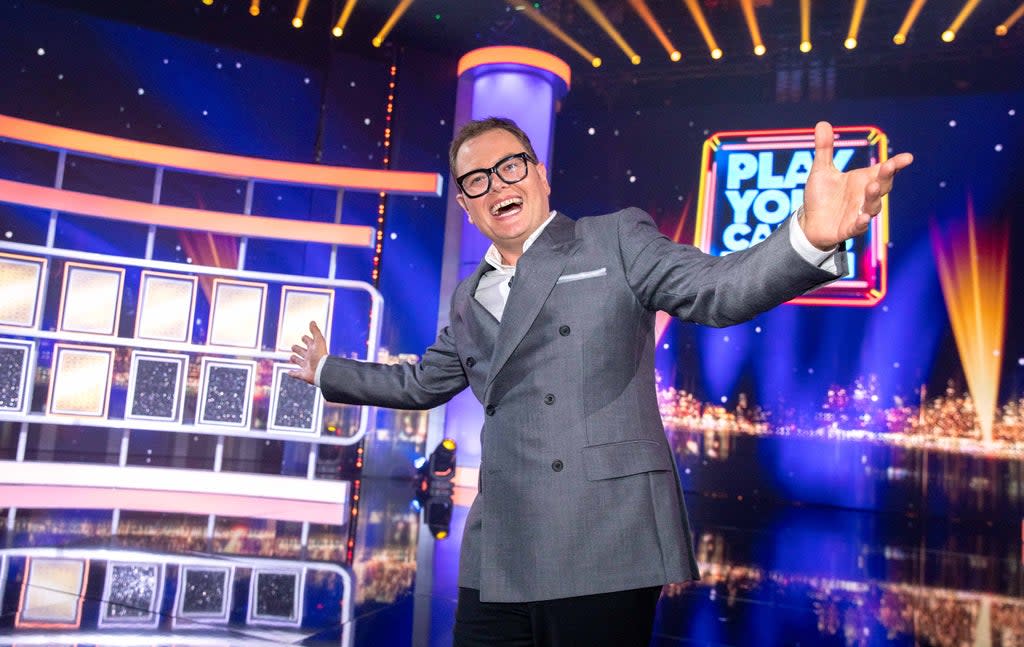 Alan Carr presenting Bullseye, the ITV gameshow known for its car giveaways (ITV)
