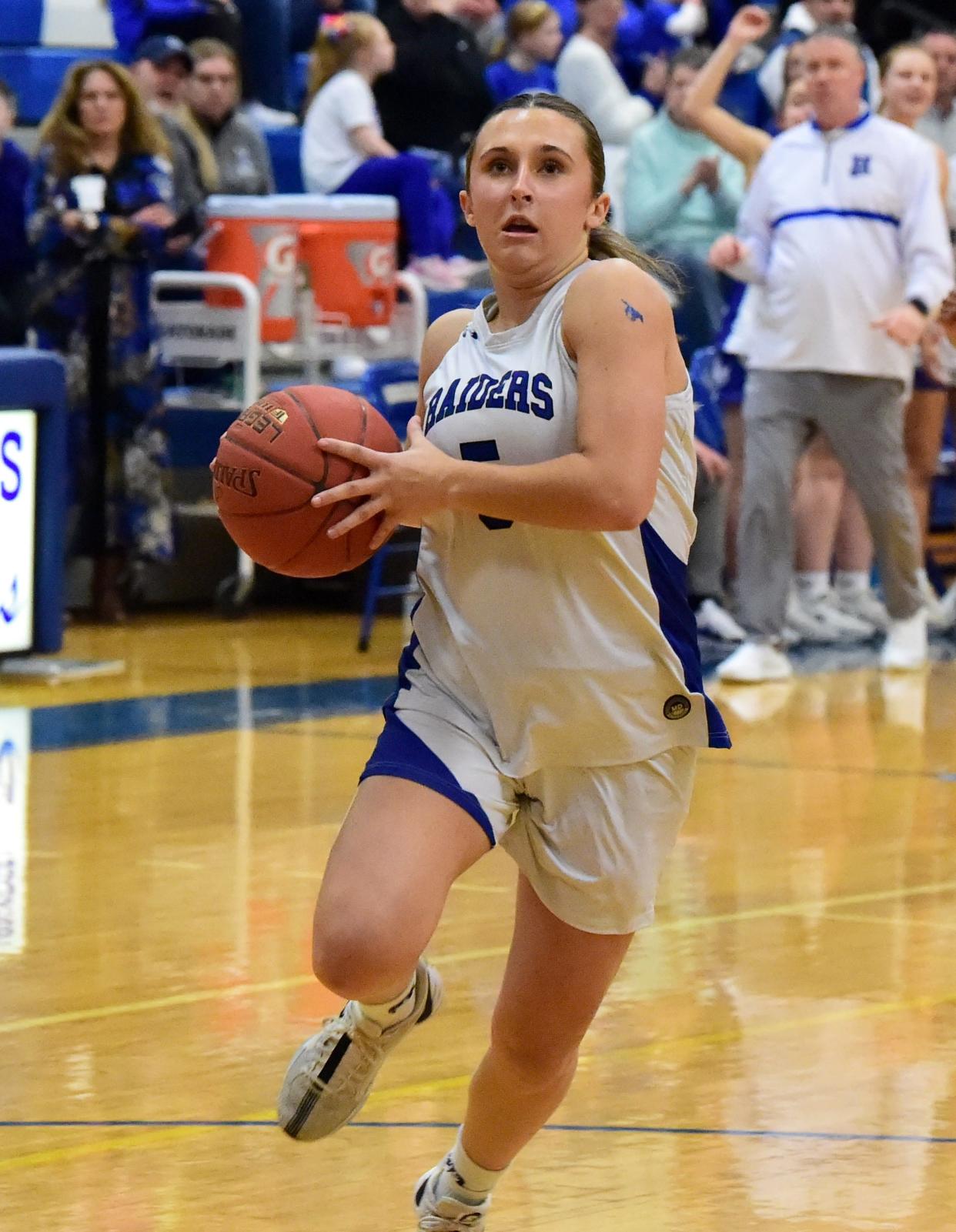 Horseheads' Sophia Bonnell takes the ball to the basket during the Blue Raiders' 52-30 win in a Section 4 Class AA girls basketball semifinal Feb. 27, 2024 at Horseheads Middle School.