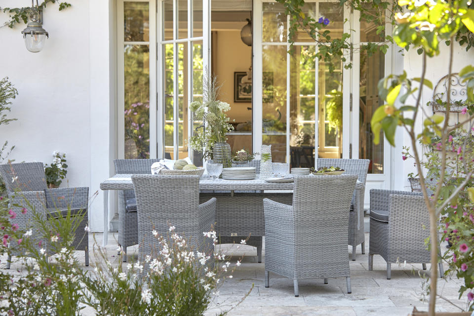 Use rattan furniture for stylish outdoor dining