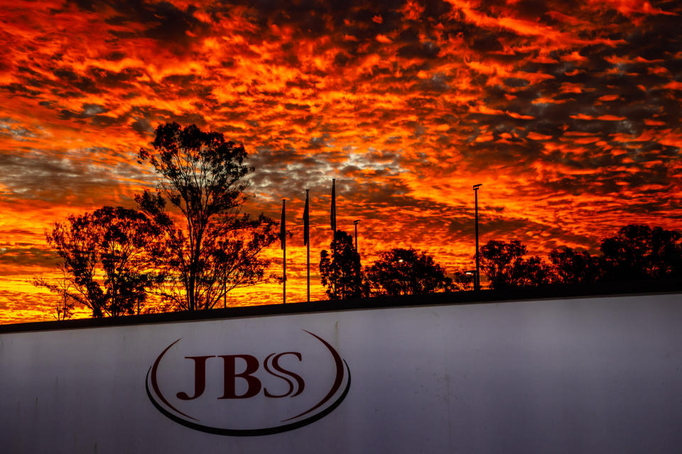 The northern Australian offices of JBS Foods is seen during sunset in Dinmore, west of Brisbane, on June 1, 2021, after the US subsidiary of the world's largest meat processing companies said it had been hacked, paralyzing some of its operations and impacting thousands of workers in Australia. (Photo by Patrick HAMILTON / AFP) (Photo by PATRICK HAMILTON/AFP /AFP via Getty Images)