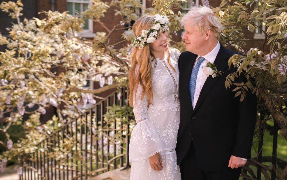 Boris Johnson and his wife Carrie Johnson in the garden of 10 Downing Street following their wedding at Westminster Cathedral in May 2021 - Getty Images Europe