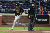 Pittsburgh Pirates' Alika Williams scores on a single hit by Bryan Reynolds during the fifth inning of a baseball game against the New York Mets at Citi Field, Tuesday, April 16, 2024, in New York. (AP Photo/Seth Wenig)