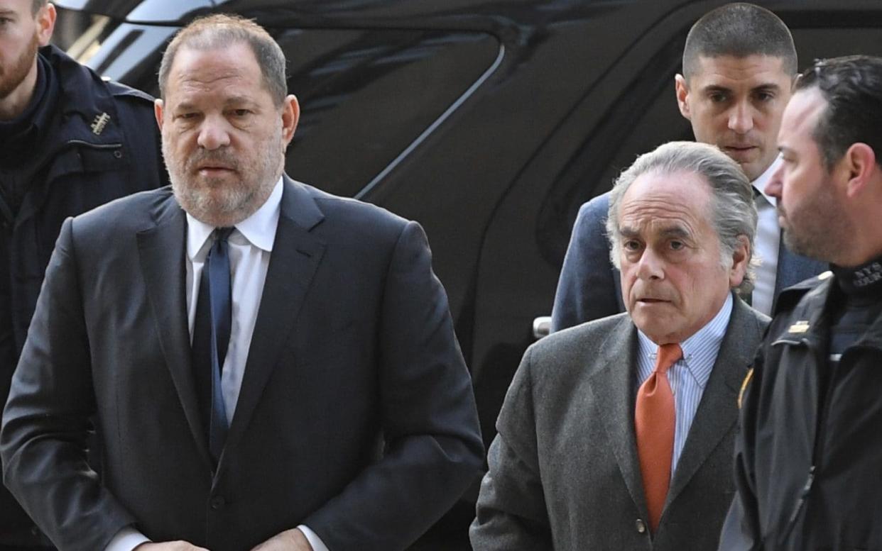 Benjamin Brafman, pictured with Harvey Weinstein at court in New York City, has confirmed he is quitting - AFP