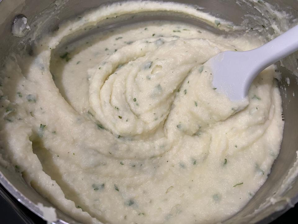 creamy, garlic mashed potatoes in a big metal pot