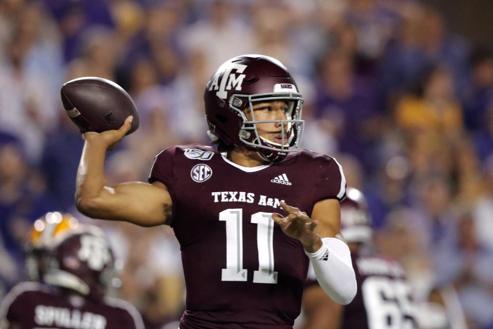 Texas A&M quarterback Kellen Mond (11) throws a pass during the first half of the team's NCAA college football game against LSU in Baton Rouge, La., Saturday, Nov. 30, 2019. (AP Photo/Gerald Herbert)
