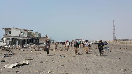 Southern Resistance fighters gather in the al-Alam entrance of Yemen's southern port city of Aden, after taking control from Houthi fighters July 31, 2015. REUTERS/Stringer