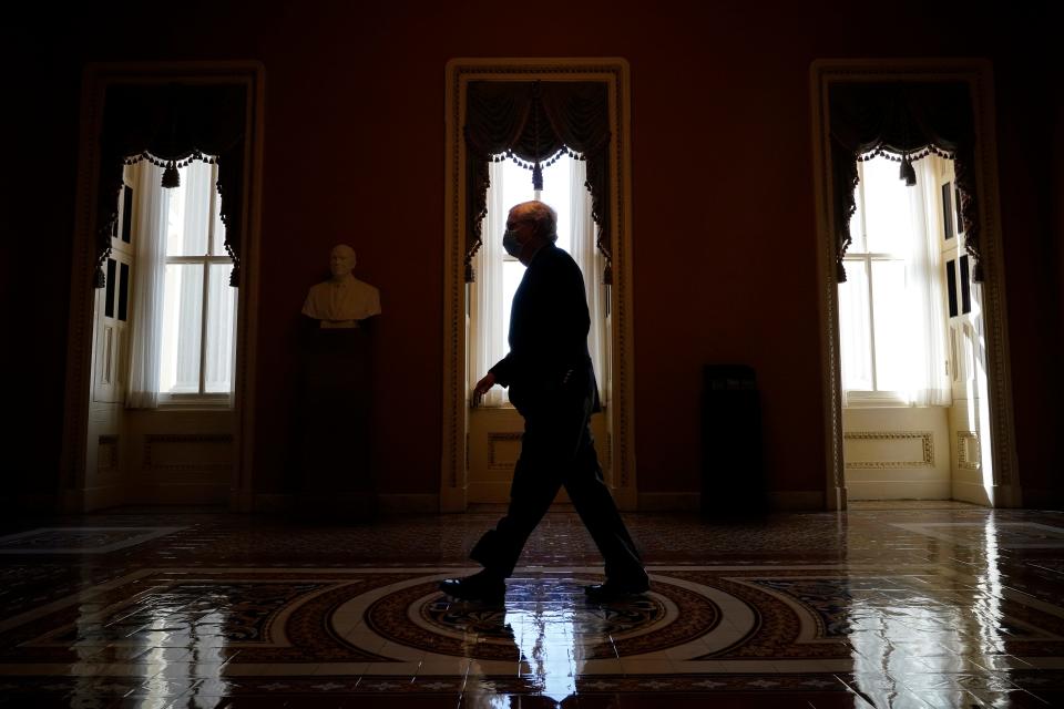 Senate Minority Leader Mitch McConnell, R-Ky., walks to his office after speaking on the Senate floor at the U.S. Capitol on Monday.