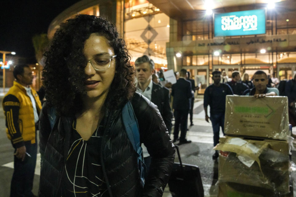 Sanaa Seif, sister of Egypt's jailed leading pro-democracy activist Alaa Abdel-Fattah, who is on a hunger and water strike, leaves the Sharm El Sheikh International Airport shortly after arriving, in Sharm el-Sheikh, Egypt, on Monday, Nov. 7, 2022. (AP Photo/Nariman El-Mofty)