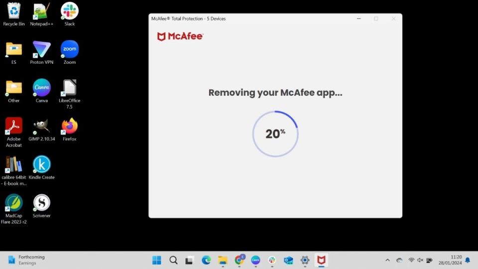 Screenshot showing how to remove McAfee from a computer using Windows Uninstall - Wait for McAfee uninstallation to complete