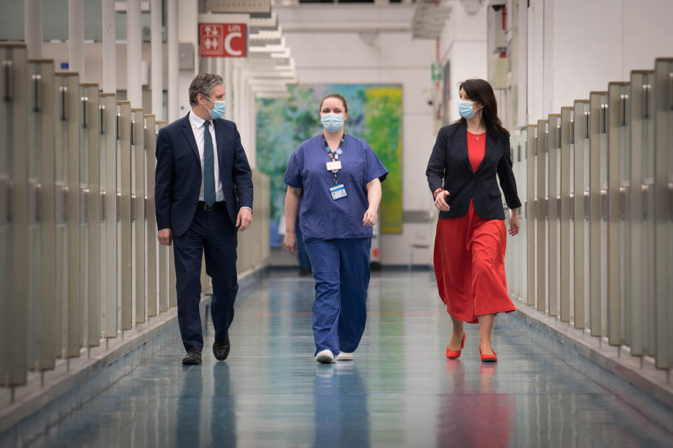 Labour party leader Sir Keir Starmer and Shadow Chancellor of the Duchy of Lancaster, Rachel Reeves chat with nurse Lisa Newell during a visit to Chelsea and Westminster Hospital, London, to thank the NHS staff for their work as the country marks the one year anniversary of the first national lockdown to prevent the spread of coronavirus. Picture date: Tuesday March 23, 2021.